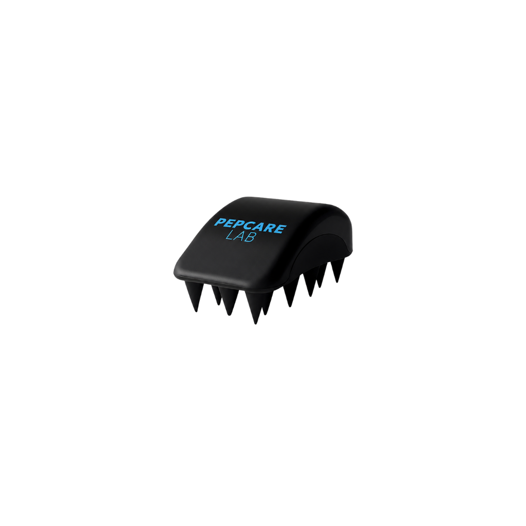 Pepcare Lab black silicone scalp brush showing flexible massage bristles